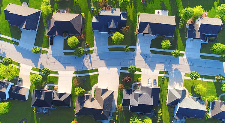 Aerial view of several houses on a residential street