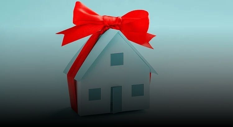 Graphic of a home with a bow on it