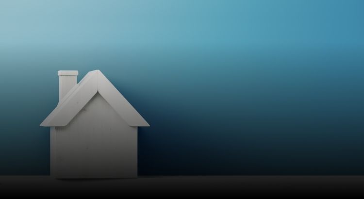 Graphic of a house against a blue background